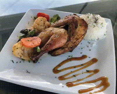 CORNISH GAME HEN WITH A SELECTION OF MIXED VEGETABLES AND A CHOICE OF WHITE RICE OR BUTTER MASHED POTATOES